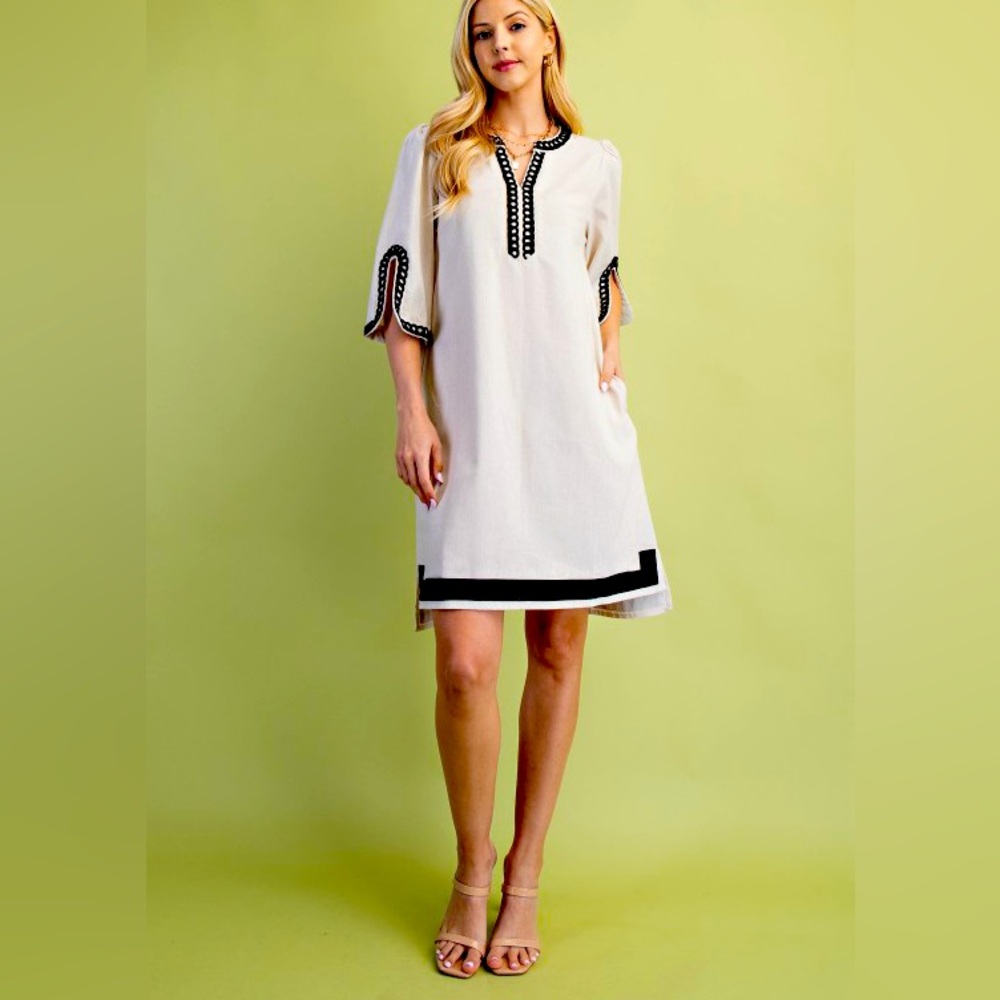 Chic Cream Dress with Black Trim